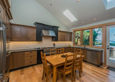 Log Renovation Nanoose: Custom Kitchen with Vaulted Ceilings
