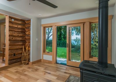 Log Renovation Nanoose: Conservatory with sliding doors