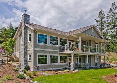 Nanoose Custom Home: Built Green Gold: Exterior walk out basement