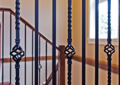 Nanoose Custom Home: Built Green Gold: Black iron stair railings