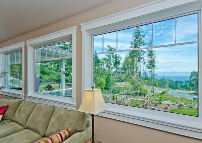 Nanoose Custom Home: Built Green Gold: Windows with mutin bars