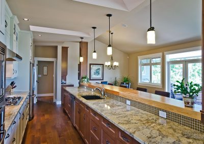 Nanoose Custom Home: Built Green Gold: Large galley kitchen