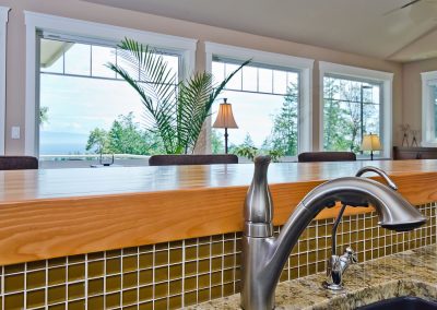 Nanoose Custom Home: Built Green Gold: 1 x 1 glass backsplash