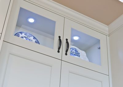 Nanoose Custom Home: Built Green Gold: In cabinetry puck lights