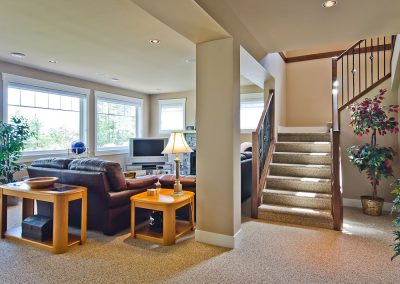Nanoose Custom Home: Built Green Gold: Maple handrail with carpet stairs