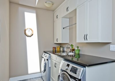 Nanoose Custom Home: Built Green Gold: Bright small laundry