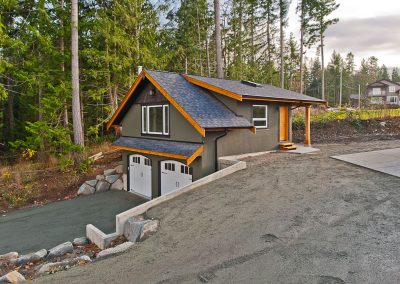 Saltair Custom Home with Detached Carriage house: Shop with living space above