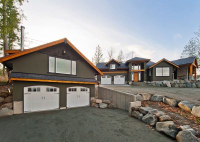 Saltair Custom Home with Detached Carriage house: Home with Shop
