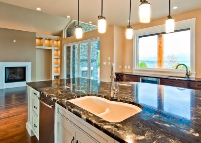 Saltair Custom Home with Detached Carriage house: Titanium granite