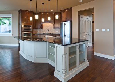 Saltair Custom Home with Detached Carriage house: Irregular shape island