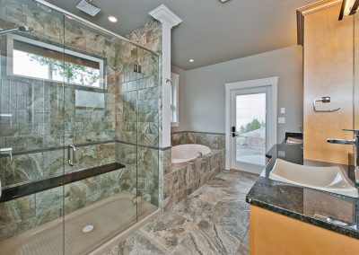 Saltair Custom Home with Detached Carriage house: Granite bench in shower