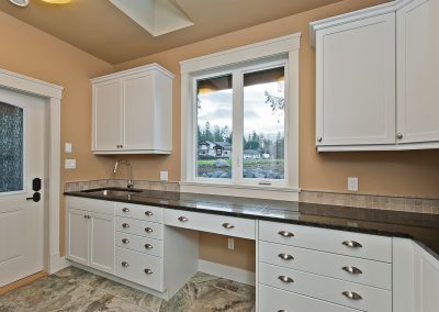 Saltair Custom Home with Detached Carriage house: Laundry and Craft room