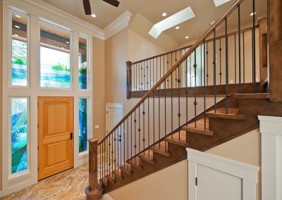Saltair Custom Home with Detached Carriage house: Foyer with maple stairs