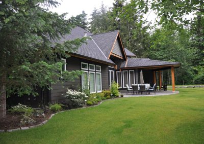 Saltair Custom Home: Custom home backyard
