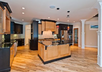 Saltair Custom Home: Two tone maple kitchen