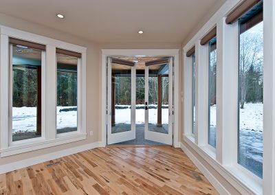 Saltair Custom Home: French doors to covered area