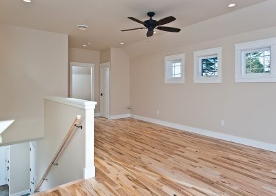 Saltair Custom Home: Games room with maple floor