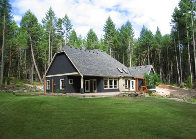 Yellowpoint Custom Home: Exterior back French Provincial