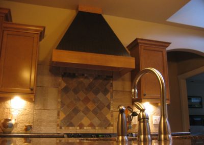 Yellowpoint Custom Home: Delta faucet on island sink