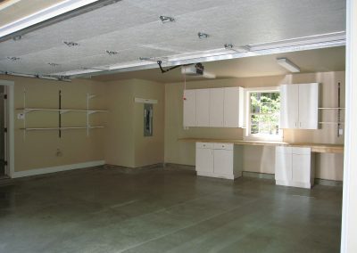 Yellowpoint Custom Home: Garage with simple shelving